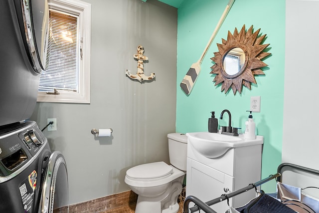 1211 Forest Circle Dr, Corbin, KY 40701 - bathroom featuring stacked washer / dryer and vanity