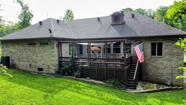 286 Ponderosa Trl, Corbin, KY 40701 - back of property featuring brick siding, a pergola, a wooden deck, a yard, and roof with shingles