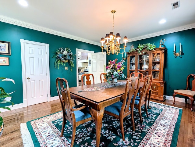 286 Ponderosa Trl, Corbin, KY 40701 - dining room with a chandelier, ornamental molding, wood finished floors, and recessed lighting