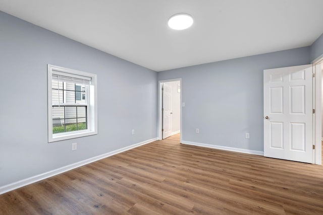 423 Perryville St, Harrodsburg, KY 40330 - unfurnished bedroom with wood finished floors
