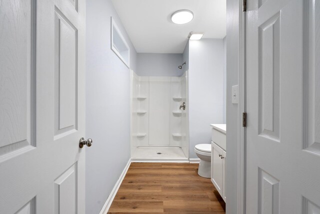 423 Perryville St, Harrodsburg, KY 40330 - bathroom with a shower, wood finished floors, and vanity