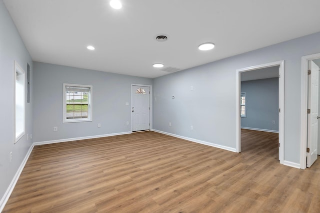 423 Perryville St, Harrodsburg, KY 40330 - empty room with wood finished floors and recessed lighting