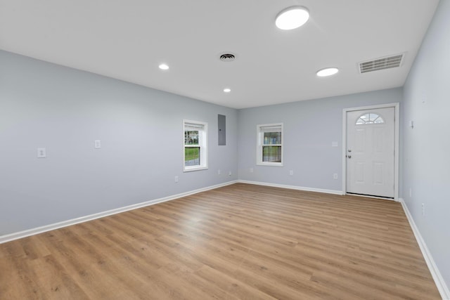 423 Perryville St, Harrodsburg, KY 40330 - unfurnished room featuring electric panel, light wood-style floors, and recessed lighting