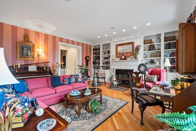 5045 Van Meter Rd, Winchester, KY 40391 - living area featuring crown molding, wood finished floors, a fireplace, wallpapered walls, and recessed lighting