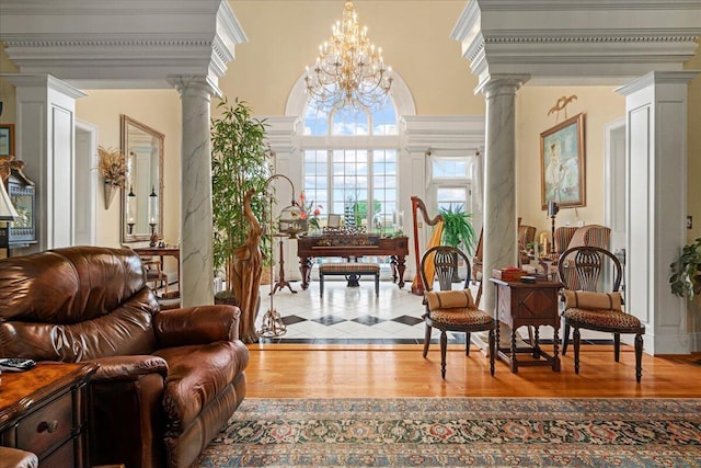 5045 Van Meter Rd, Winchester, KY 40391 - sitting room with decorative columns, wood finished floors, healthy amount of natural light, and ornamental molding