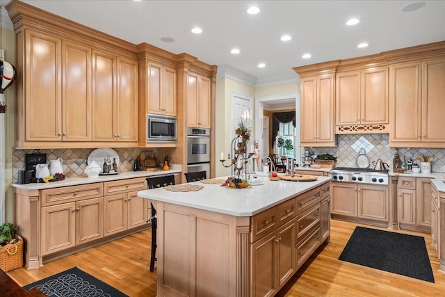 5045 Van Meter Rd, Winchester, KY 40391 - kitchen with appliances with stainless steel finishes, decorative backsplash, light wood-style floors, light countertops, and recessed lighting