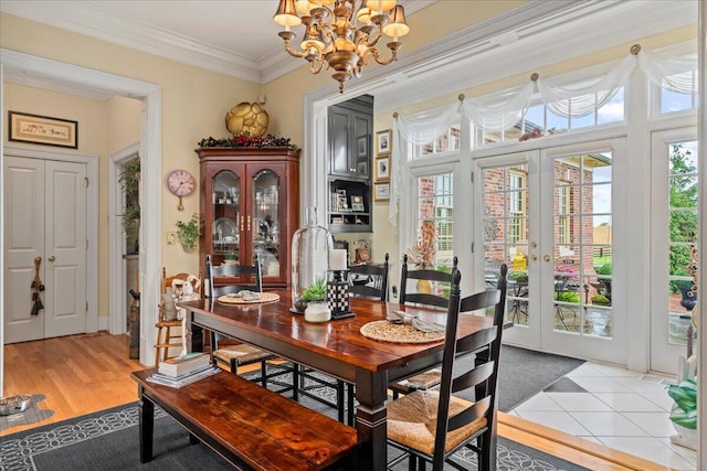 5045 Van Meter Rd, Winchester, KY 40391 - dining room with french doors, a chandelier, and ornamental molding