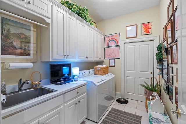 5045 Van Meter Rd, Winchester, KY 40391 - washroom featuring washer and clothes dryer, cabinet space, and light tile patterned floors