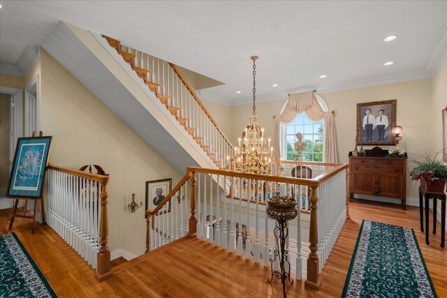 5045 Van Meter Rd, Winchester, KY 40391 - staircase with wood finished floors, ornamental molding, recessed lighting, and a chandelier