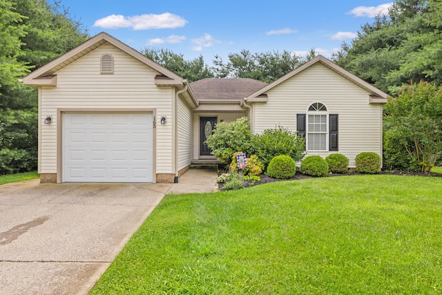 165 Rolling Meadows Dr, Stanford, KY 40484 - ranch-style home featuring concrete driveway, a front yard, and an attached garage