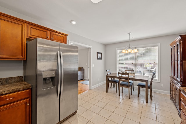 165 Rolling Meadows Dr, Stanford, KY 40484 - kitchen featuring stainless steel fridge with ice dispenser, a chandelier, light tile patterned floors, recessed lighting, and decorative light fixtures