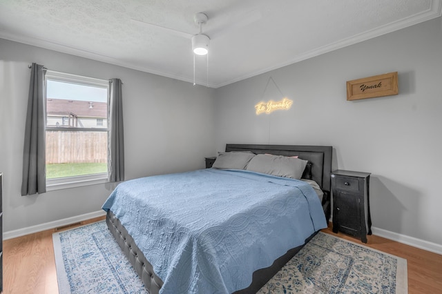 210 Taylorsville Trl, Georgetown, KY 40324 - bedroom featuring ornamental molding, wood finished floors, and a ceiling fan