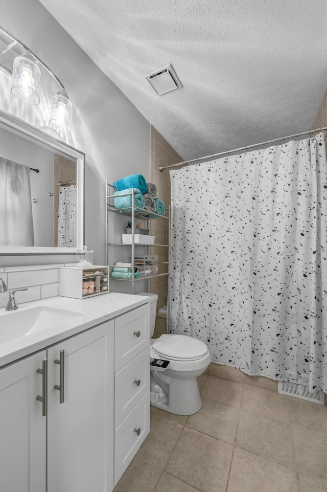 210 Taylorsville Trl, Georgetown, KY 40324 - bathroom featuring a textured ceiling, vanity, tile patterned flooring, and a shower with curtain
