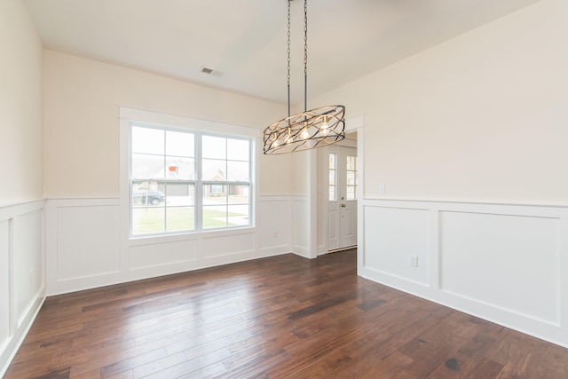 4185 Buttermilk Rd, Lexington, KY 40509 - unfurnished dining area with a chandelier, a wainscoted wall, a decorative wall, and dark wood-style floors