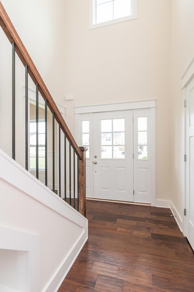 4185 Buttermilk Rd, Lexington, KY 40509 - entryway featuring a towering ceiling, stairs, plenty of natural light, and dark wood-style flooring