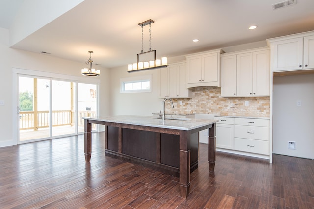 4185 Buttermilk Rd, Lexington, KY 40509 - kitchen with backsplash, dark wood-type flooring, decorative light fixtures, white cabinetry, and recessed lighting