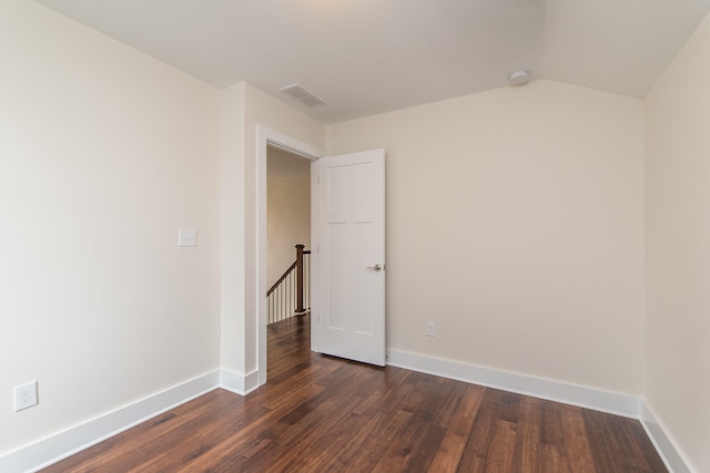 4185 Buttermilk Rd, Lexington, KY 40509 - spare room with dark wood-style floors, a smoke detector, and lofted ceiling