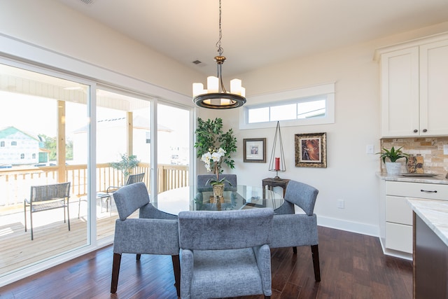 4185 Buttermilk Rd, Lexington, KY 40509 - dining space featuring a chandelier and dark wood-type flooring