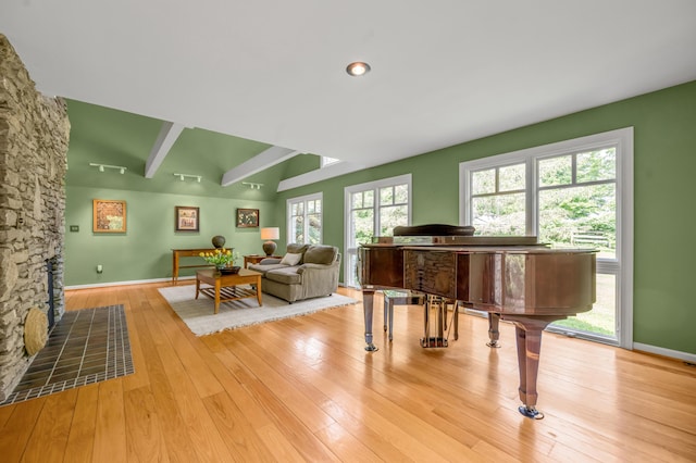 2968 Delong Rd, Lexington, KY 40515 - living room with healthy amount of natural light, wood finished floors, and beam ceiling