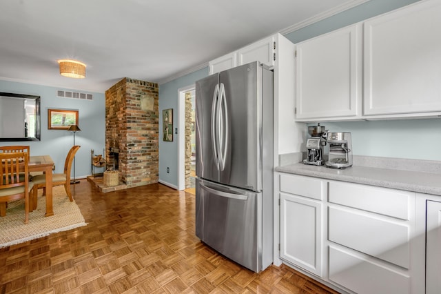 2968 Delong Rd, Lexington, KY 40515 - kitchen featuring freestanding refrigerator, light countertops, and white cabinets
