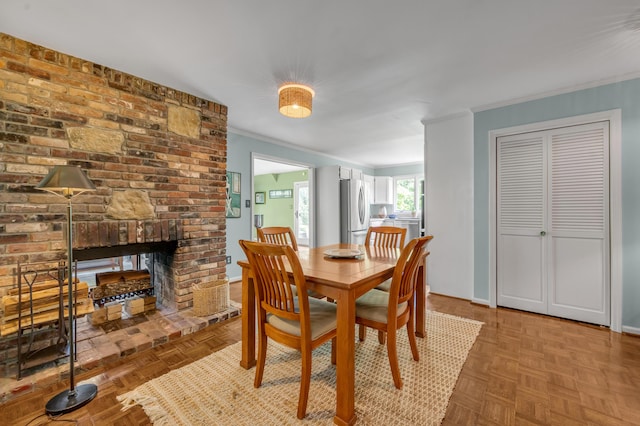 2968 Delong Rd, Lexington, KY 40515 - dining space featuring crown molding and a fireplace