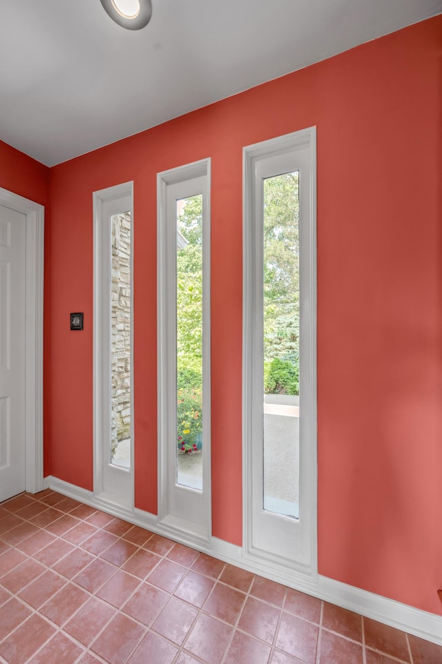2968 Delong Rd, Lexington, KY 40515 - foyer entrance with light tile patterned floors and baseboards