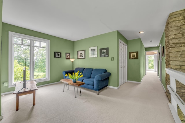 2968 Delong Rd, Lexington, KY 40515 - living area featuring carpet flooring and a stone fireplace