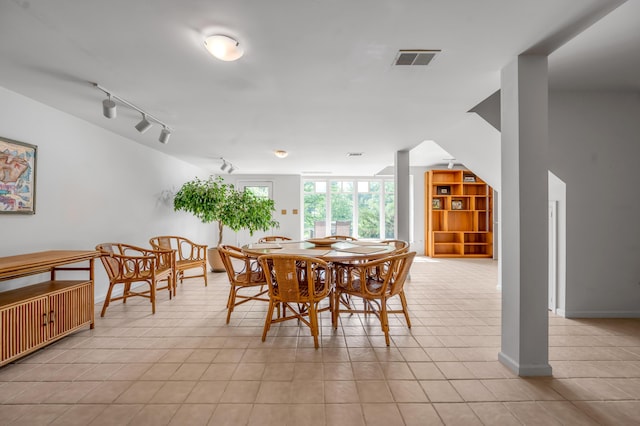 2968 Delong Rd, Lexington, KY 40515 - dining area with light tile patterned flooring and rail lighting