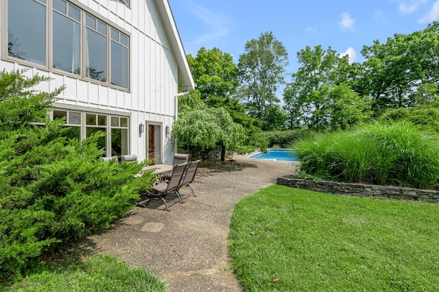 2968 Delong Rd, Lexington, KY 40515 - view of green lawn featuring a patio and an outdoor pool