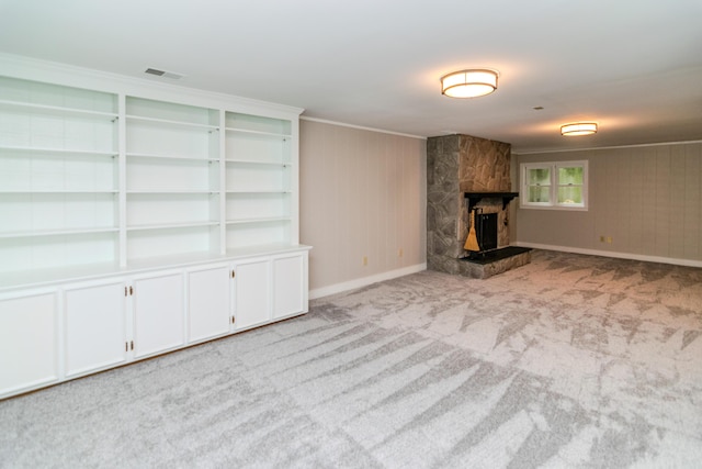 395 Redding Rd Unit 30, Lexington, KY 40517 - unfurnished living room with a fireplace, carpet flooring, and crown molding