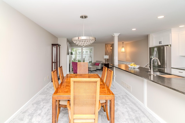395 Redding Rd Unit 30, Lexington, KY 40517 - dining area with light colored carpet, a chandelier, and recessed lighting