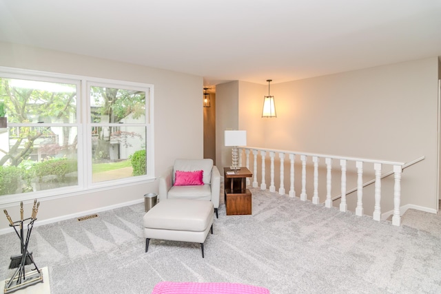 395 Redding Rd Unit 30, Lexington, KY 40517 - sitting room with carpet floors and an upstairs landing