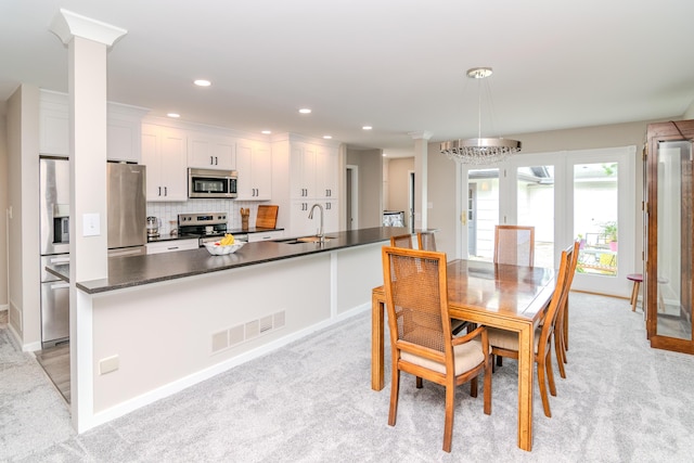 395 Redding Rd Unit 30, Lexington, KY 40517 - dining area with light colored carpet and recessed lighting