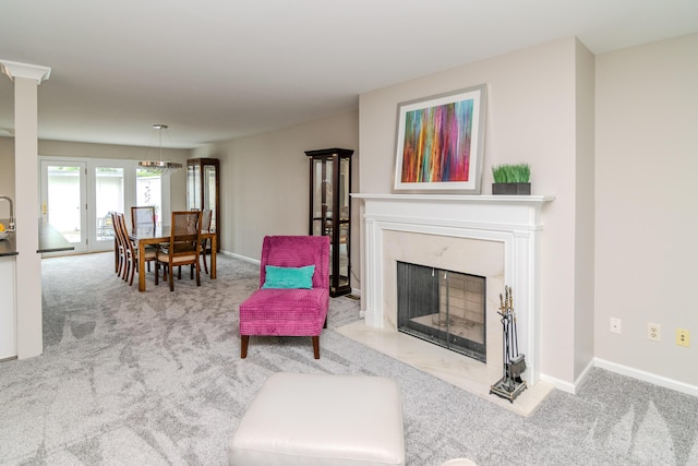395 Redding Rd Unit 30, Lexington, KY 40517 - carpeted living area featuring baseboards and a high end fireplace