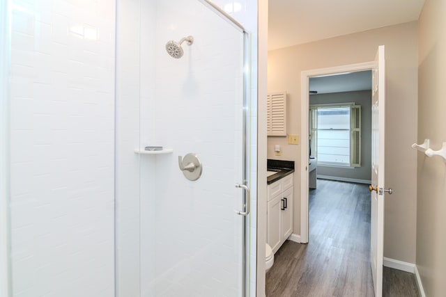 395 Redding Rd Unit 30, Lexington, KY 40517 - bathroom with a shower stall, wood finished floors, and vanity