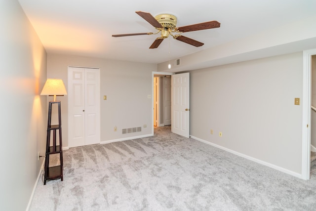 395 Redding Rd Unit 30, Lexington, KY 40517 - unfurnished bedroom featuring carpet, ceiling fan, and a closet
