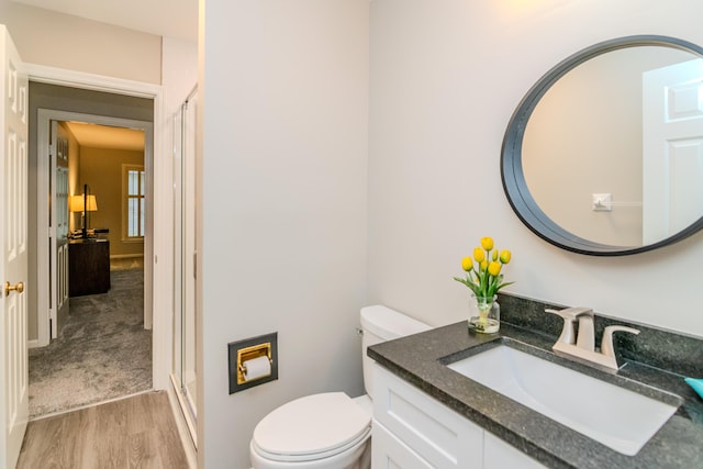395 Redding Rd Unit 30, Lexington, KY 40517 - bathroom with wood finished floors, vanity, and an enclosed shower
