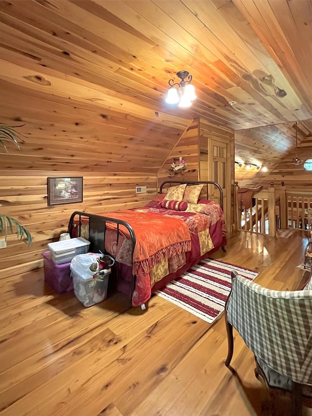 250 Hilltop Ests, Morehead, KY 40351 - bedroom with lofted ceiling, hardwood / wood-style flooring, wood walls, and wooden ceiling