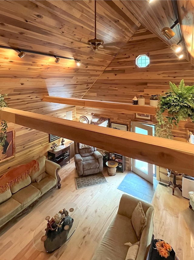 250 Hilltop Ests, Morehead, KY 40351 - living room featuring wood ceiling, wood walls, wood finished floors, and high vaulted ceiling