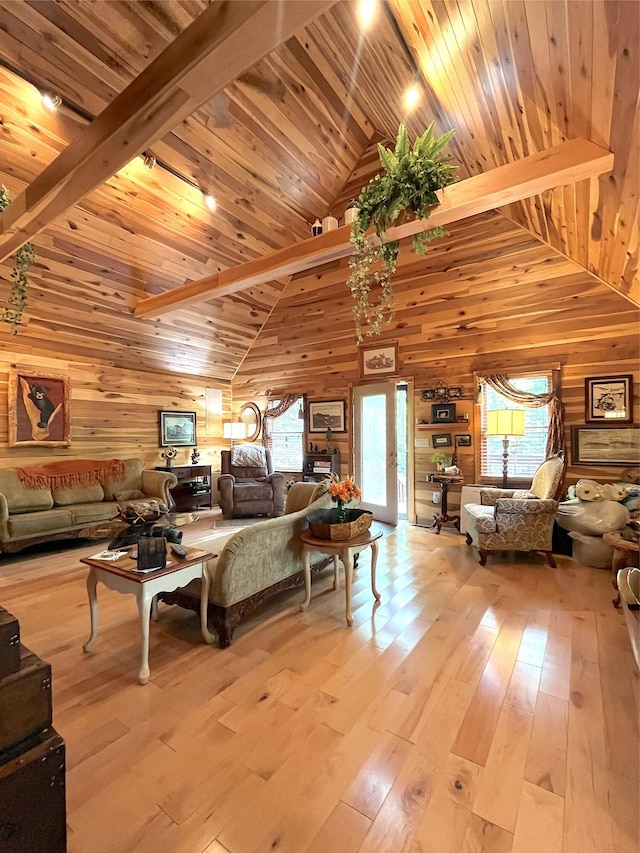 250 Hilltop Ests, Morehead, KY 40351 - living room featuring wooden walls, healthy amount of natural light, hardwood / wood-style flooring, high vaulted ceiling, and a wood ceiling with exposed beams