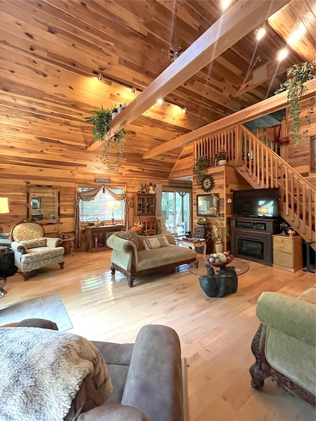 250 Hilltop Ests, Morehead, KY 40351 - living room featuring wood walls, wood ceiling, stairway, and wood finished floors