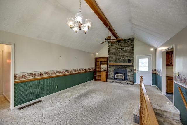 560 Kemper Ln, Danville, KY 40422 - unfurnished living room featuring carpet floors, ceiling fan, a wainscoted wall, a fireplace, and a chandelier