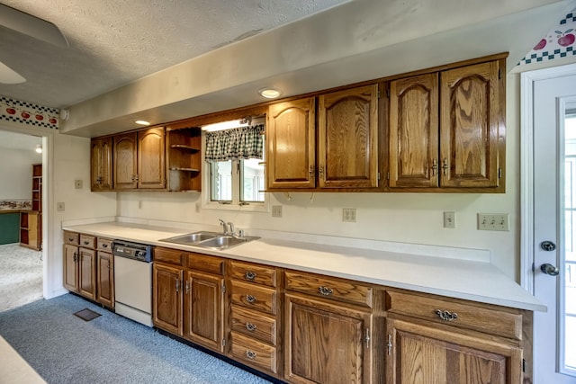 560 Kemper Ln, Danville, KY 40422 - kitchen featuring dishwasher, carpet, light countertops, brown cabinets, and a textured ceiling