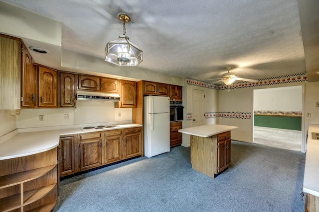 560 Kemper Ln, Danville, KY 40422 - kitchen featuring white appliances, under cabinet range hood, a kitchen island, a ceiling fan, and light countertops