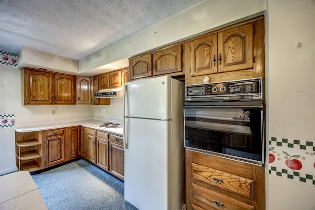 560 Kemper Ln, Danville, KY 40422 - kitchen with white appliances, brown cabinetry, a textured ceiling, light countertops, and under cabinet range hood