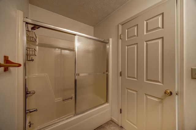 560 Kemper Ln, Danville, KY 40422 - bathroom with shower / bath combination with glass door and a textured ceiling
