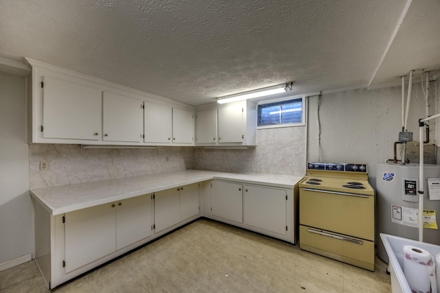 560 Kemper Ln, Danville, KY 40422 - below grade area featuring electric water heater, a textured ceiling, and light flooring