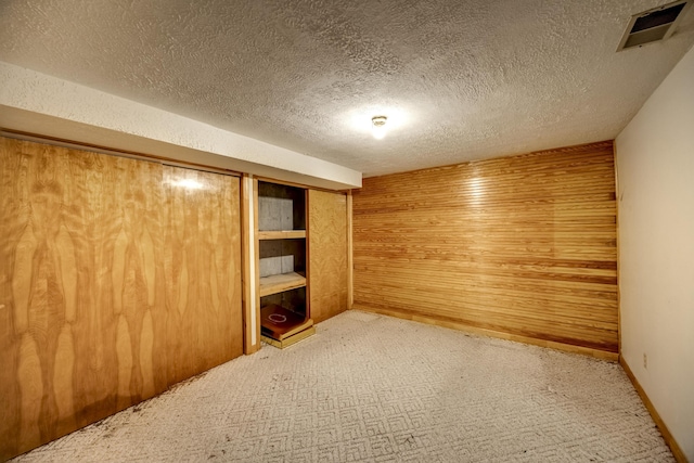 560 Kemper Ln, Danville, KY 40422 - finished below grade area featuring carpet, a textured ceiling, and wooden walls