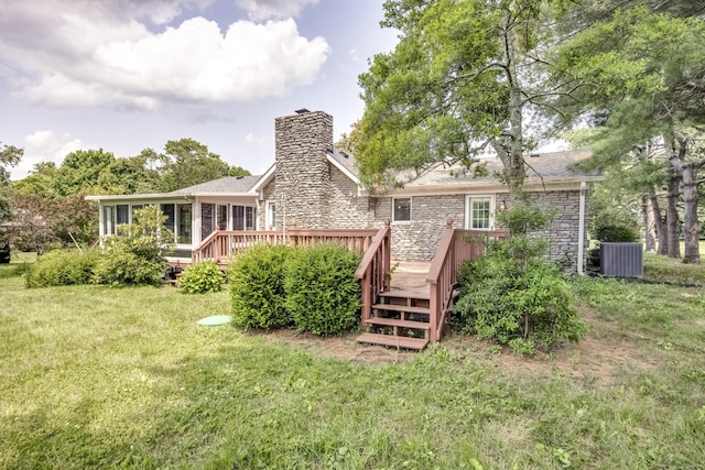560 Kemper Ln, Danville, KY 40422 - rear view of house with stone siding, a deck, a chimney, and a lawn