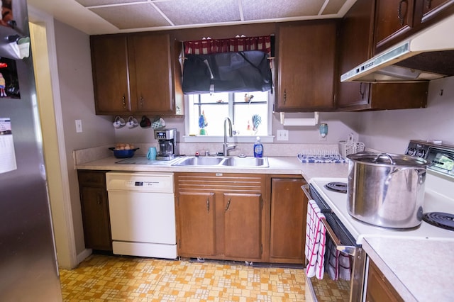 1181 Tracy Rd, Lawrenceburg, KY 40342 - kitchen with white appliances, under cabinet range hood, and light countertops